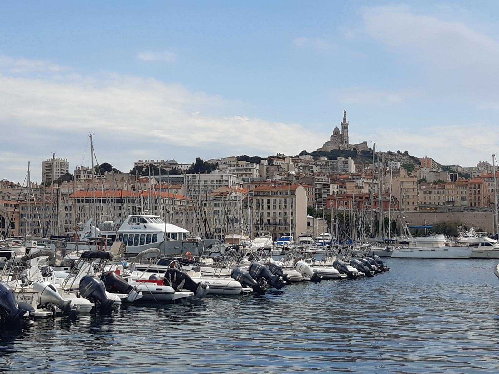 Marseille Old Port full of motorboats lining the shore