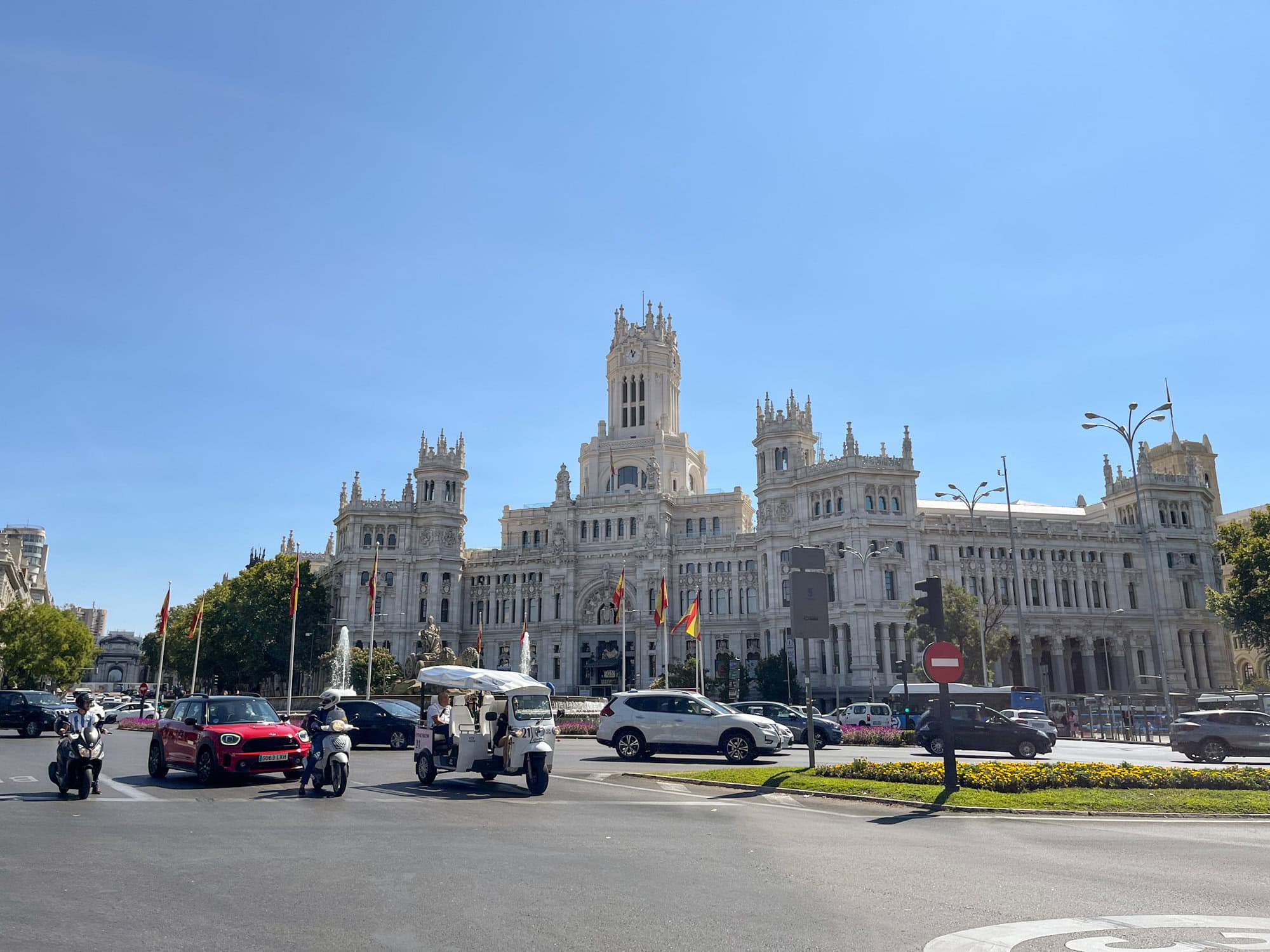 traffic driving around Cibeles Fountain in Madrid