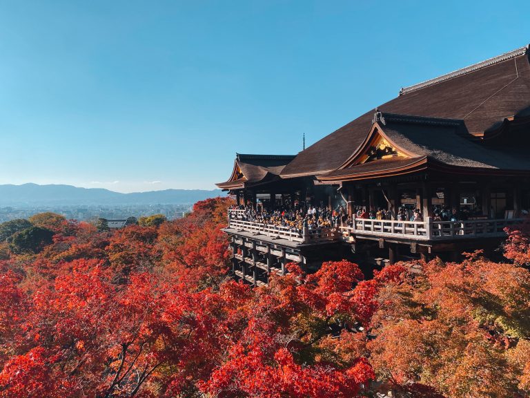 from Kiyomizu-dera viewing platform in Kyoto with fall foliage.