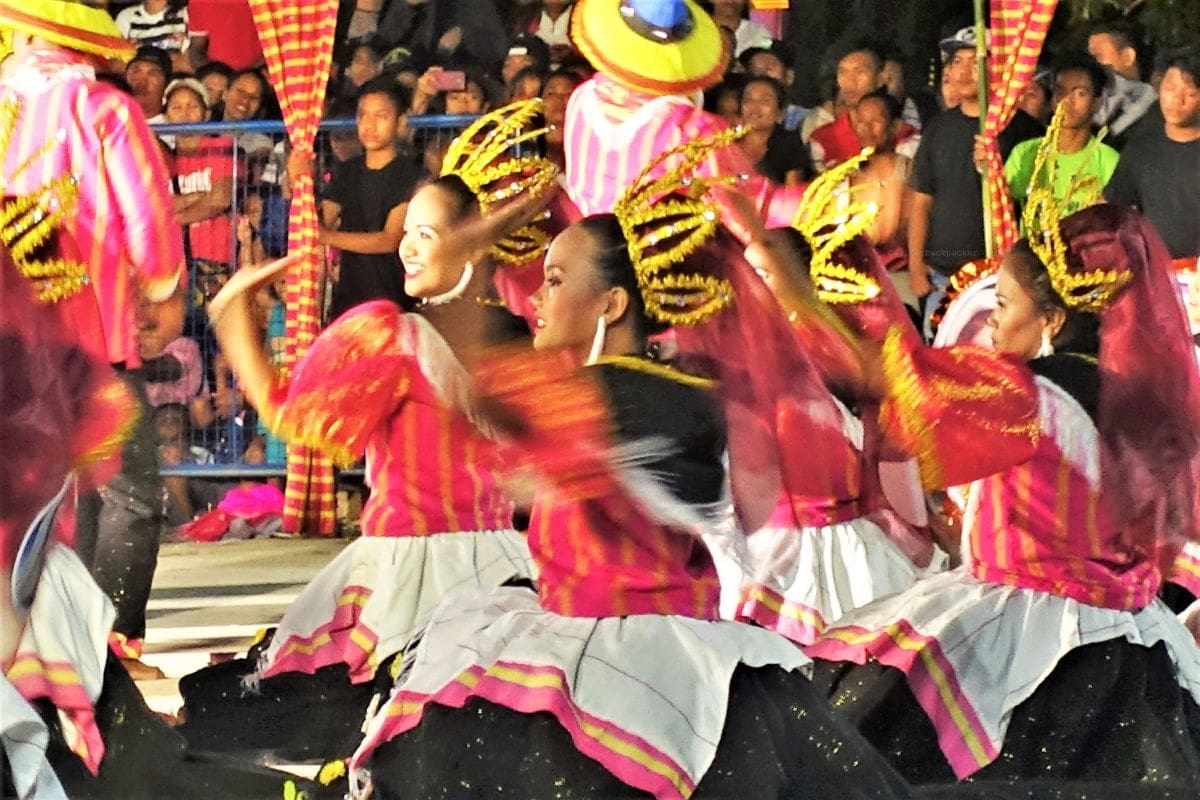 Abel Festival in La Paz, Abra, Philippines young girls dressed in traditional costumes dancing in the streets