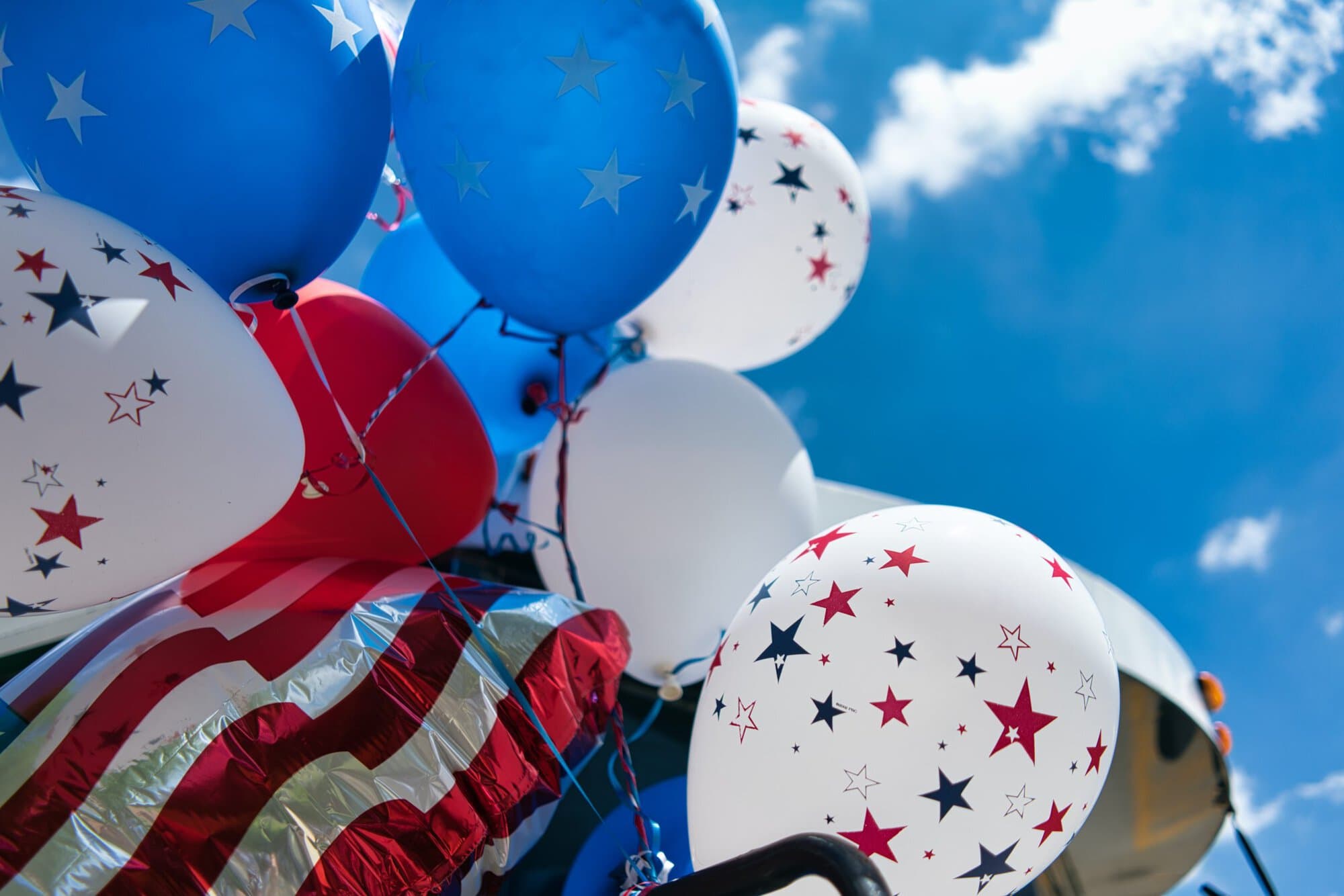 Red-White-Blue balloons and flags at the biggest USA Festival in July on the 4th