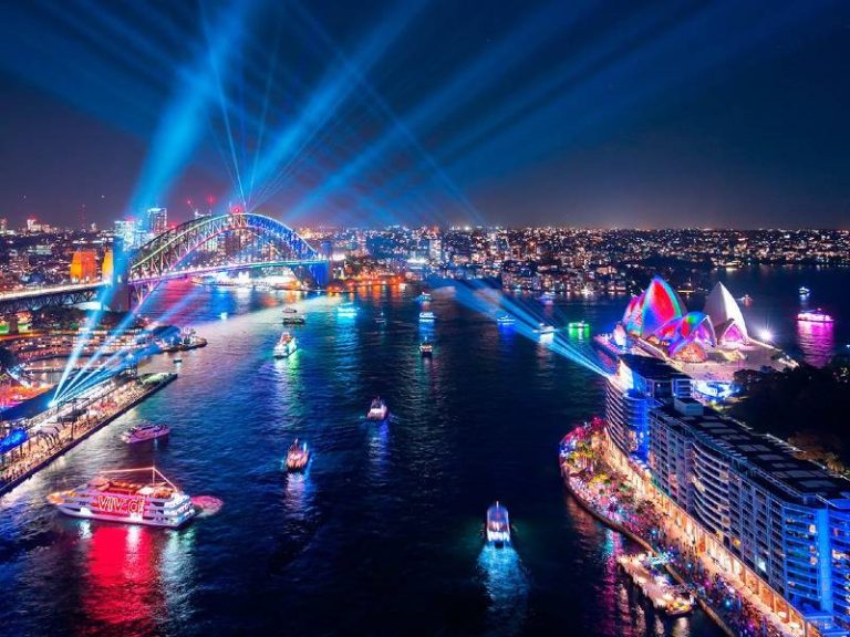 VIVID Sydney viewed above showing lights projected on sydney opera house and harbour bridge