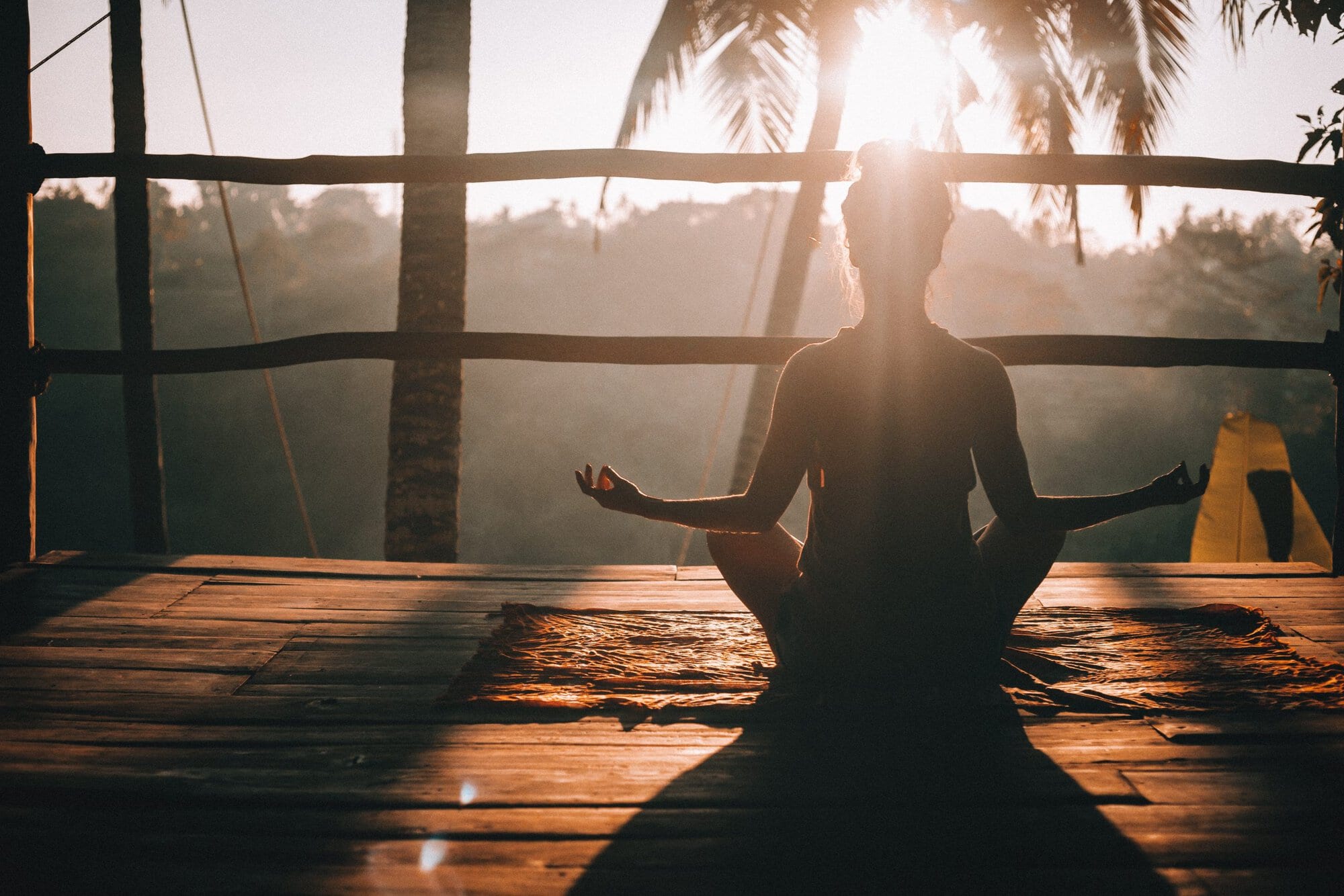 a woman doing yoga in ubud at BaliSpirit Festival