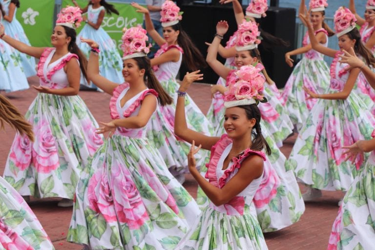 women dressed in traditional costume dancing