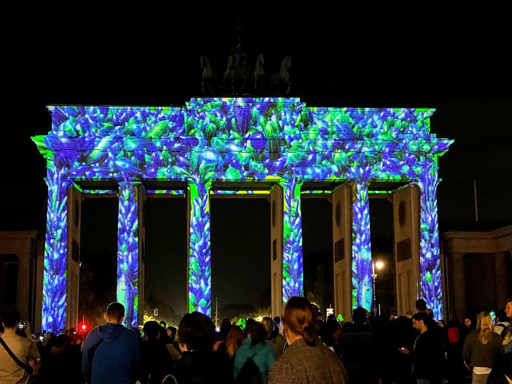 Brandenburger Tor with a light display on it at the Festival of Lights in Berlin