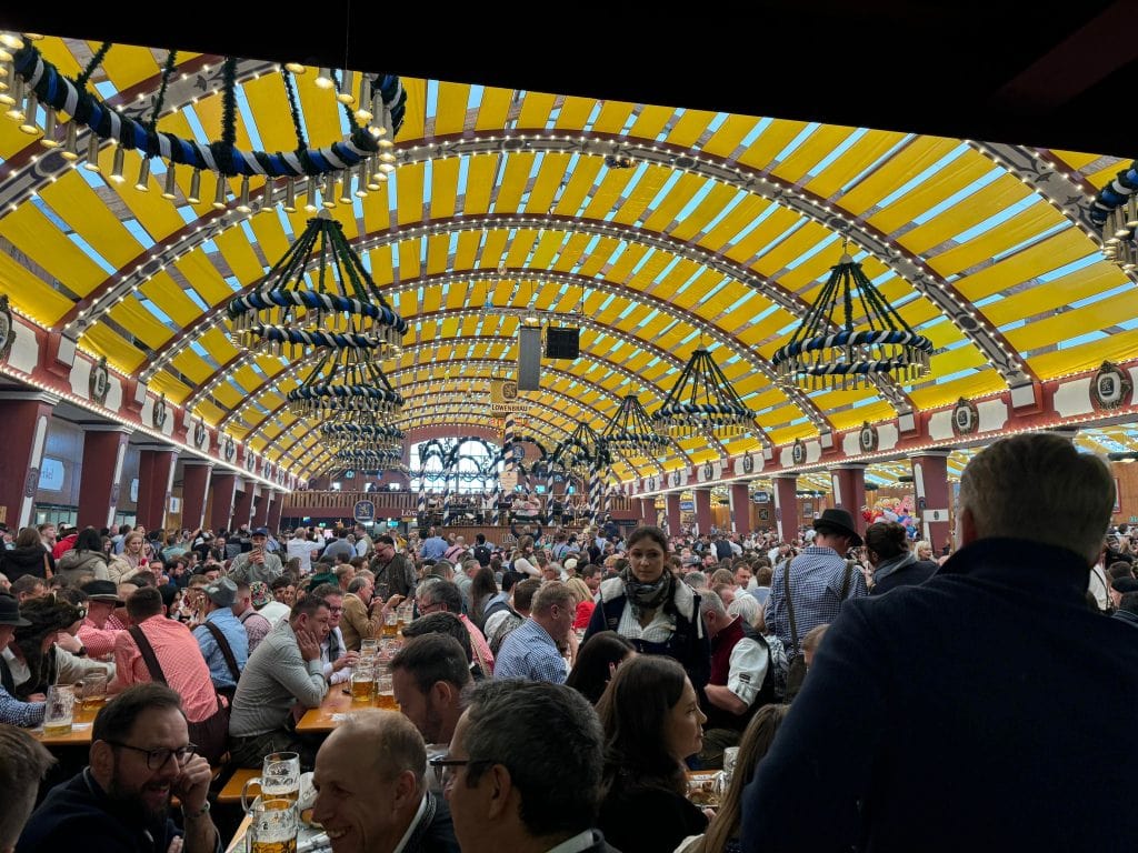 beer hall in munich with lots of tables of people