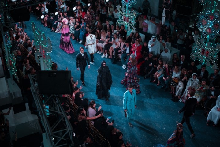 models walking down a catwalk at fashion week