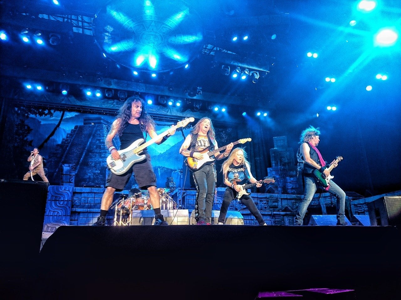 the band iron maiden on stage performing