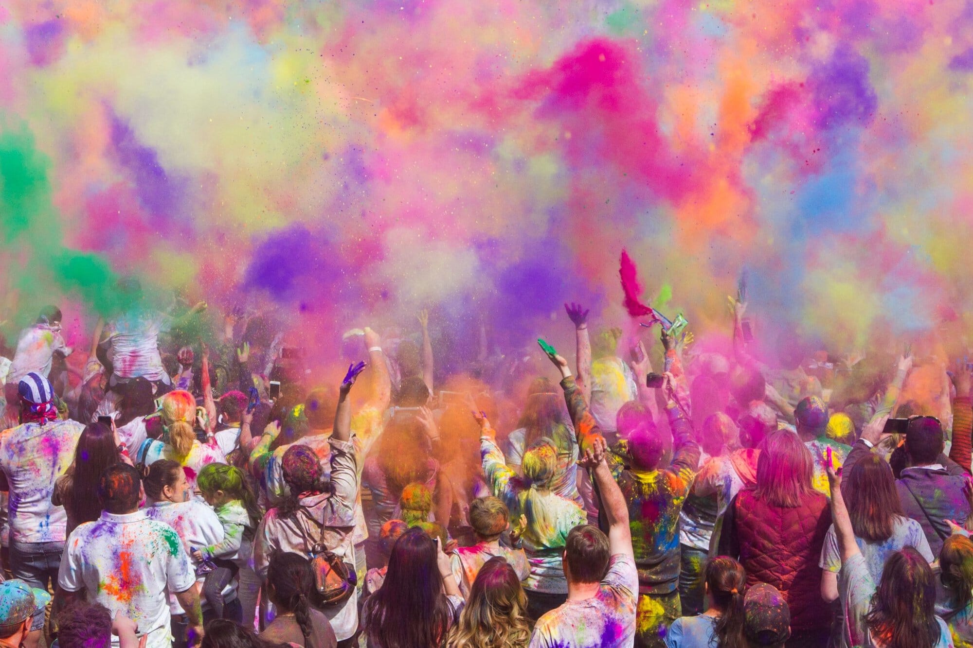 Throwing coloured powder at the holi festival in india