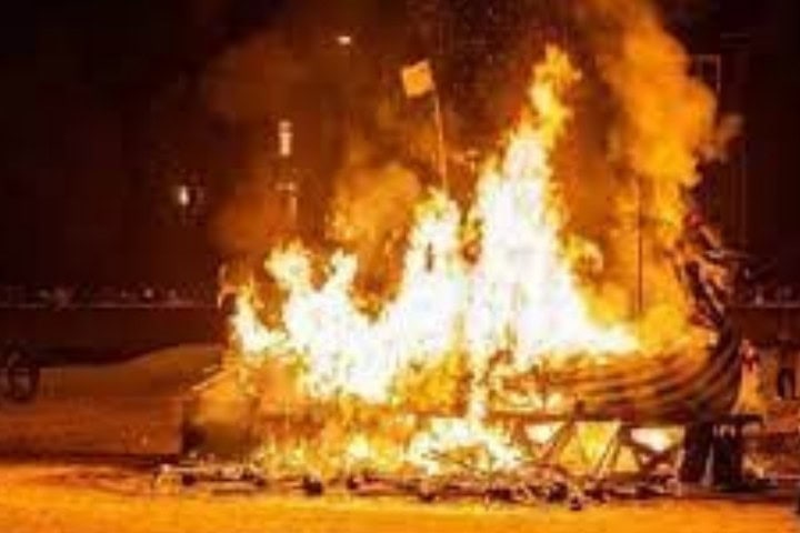 burning of a viking ship during up helly aa celebrations in scotland