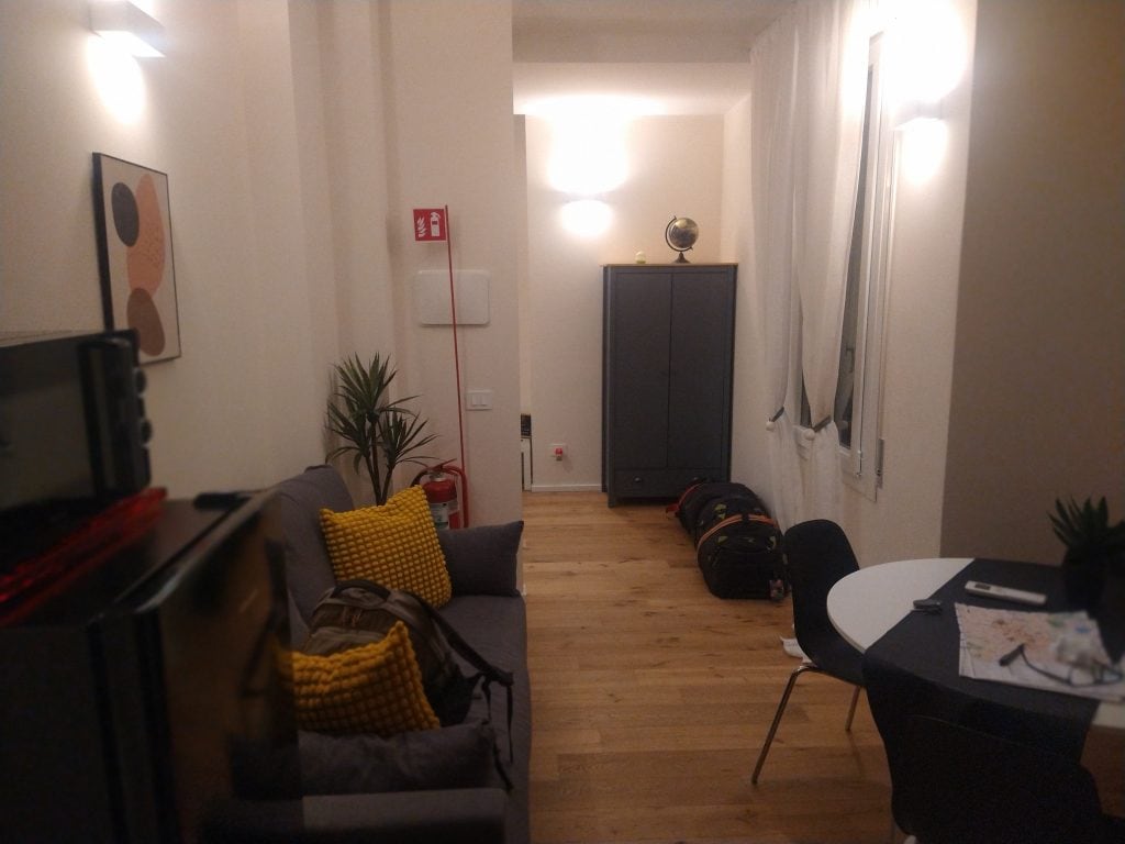 Small budget apartment in Ravenna showing compact living space for affordable accommodation while travelling