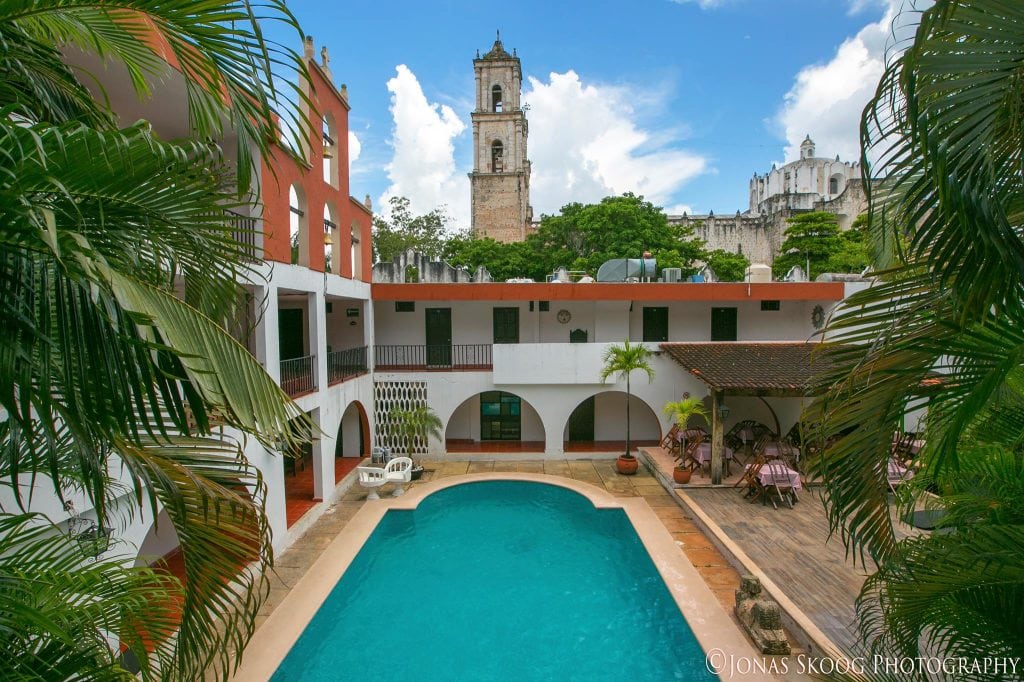 Boutique hotel courtyard with pool in Valladolid showing affordable accommodation in a central location