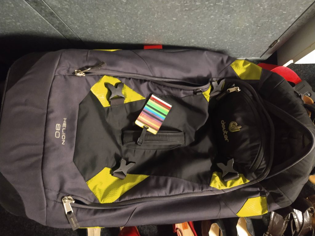 Hybrid travel backpack used for long term travel packing with organised compartments