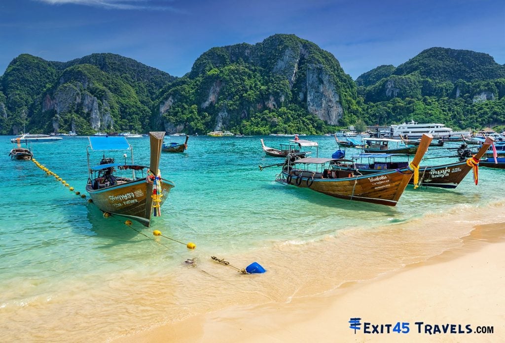 Longtail boats on Tonsai Bay, Koh Phi Phi Thailand in March, ideal for best countries to visit by month