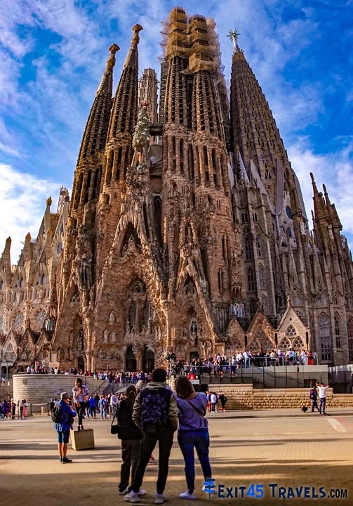 Sagrada Familia in Barcelona with people gathered outside the landmark