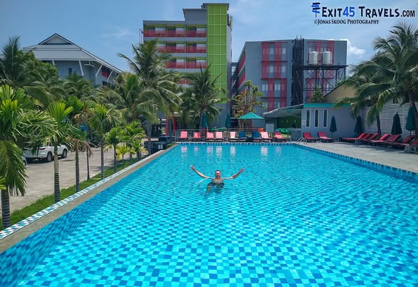 Quiet resort pool during shoulder season travel in Thailand
