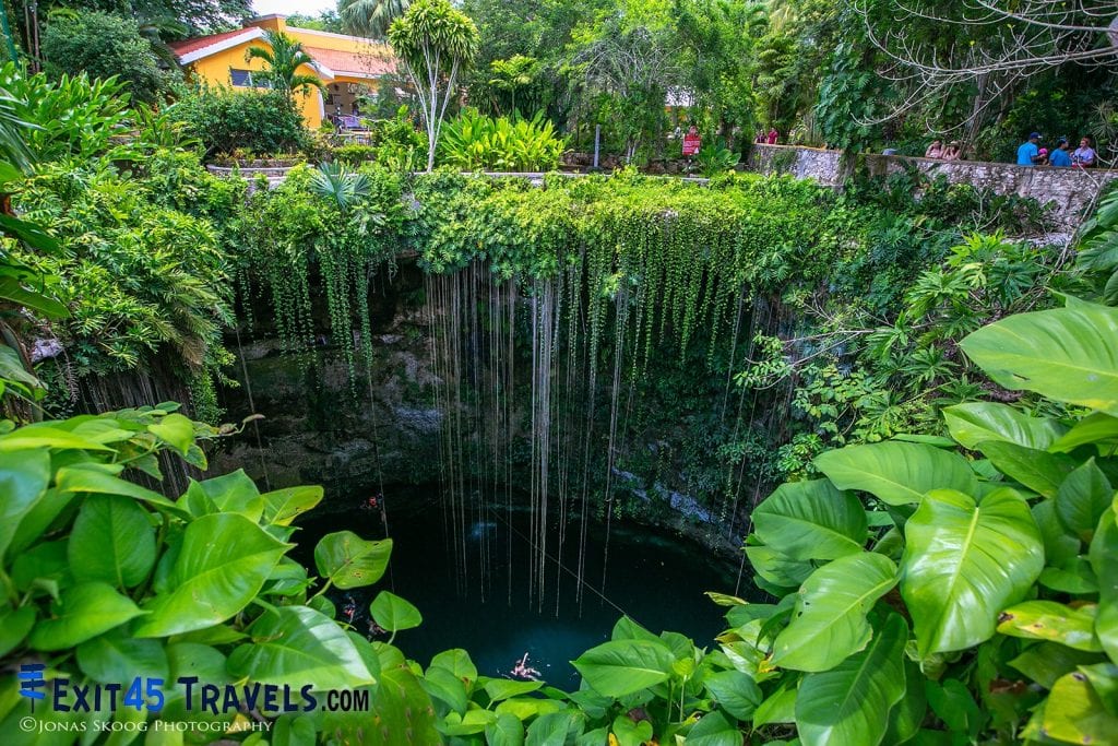 Cenote in Yucatan, Mexico surrounded by jungle, a unique slow travel destination