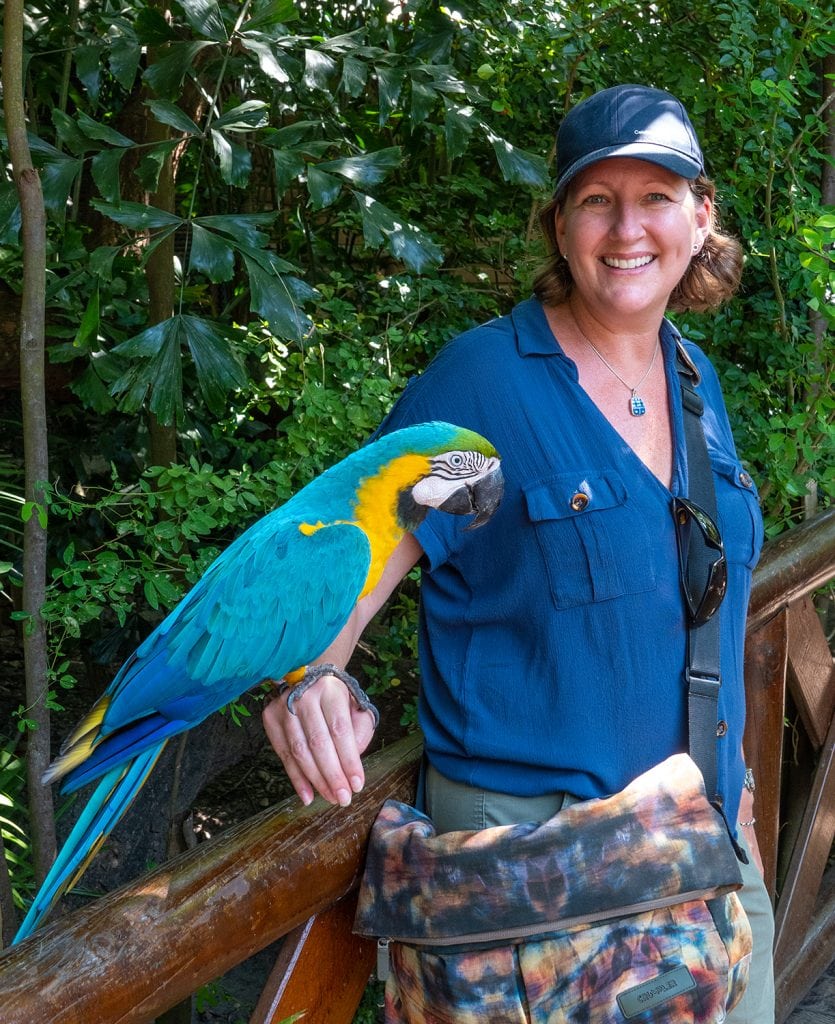 Peta wearing a crossbody bag to keep valuables secure while exploring a new destination.